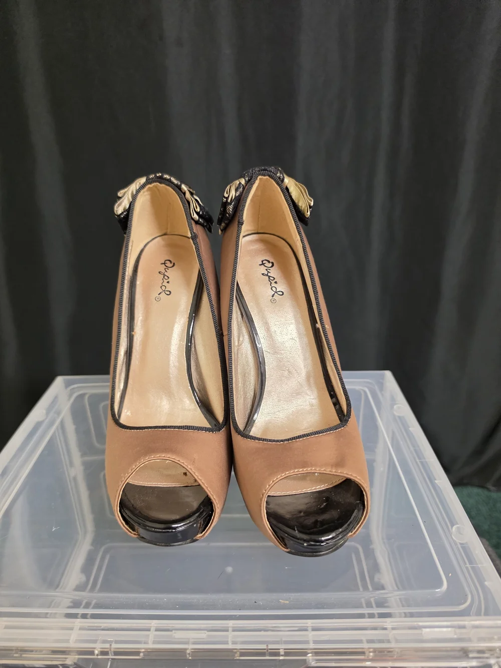 Qupid Blush Peep-Toe Stiletto Heels with Black Trim and Bow Accent